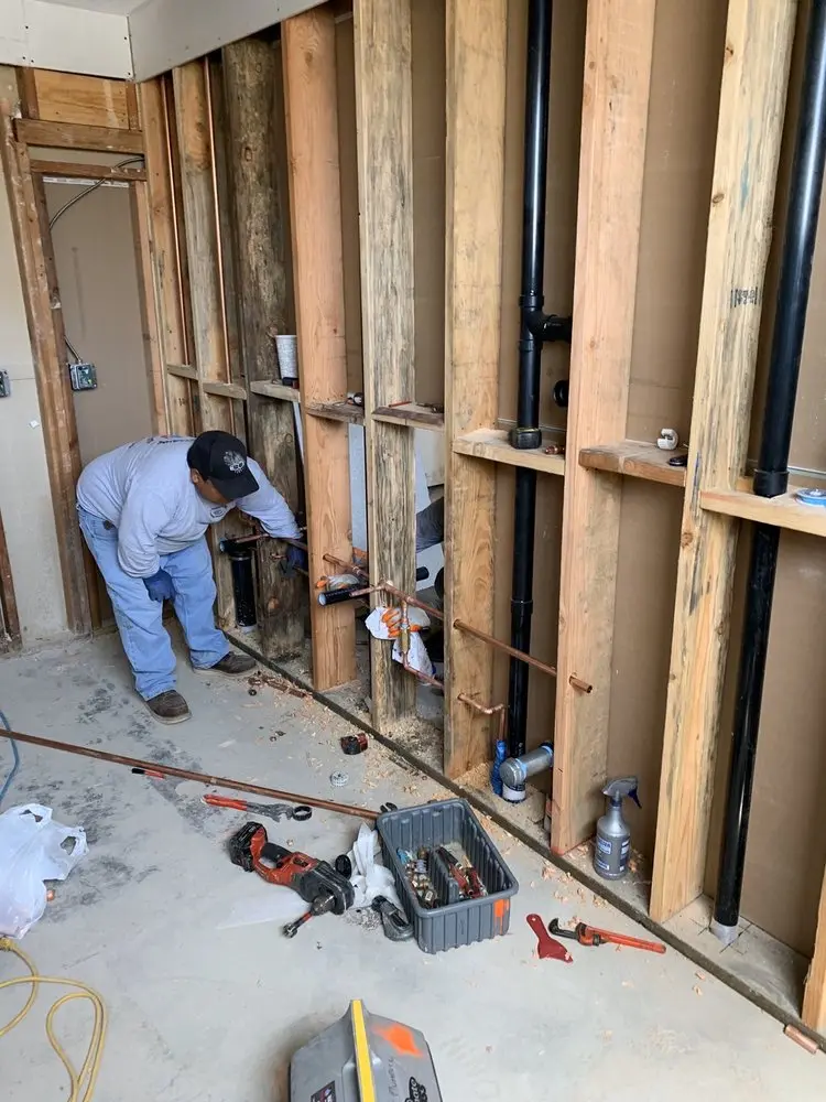 Commercial rough-in plumbing for Water Heater Replacement in Monroe Manor